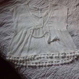 Off white blouse.